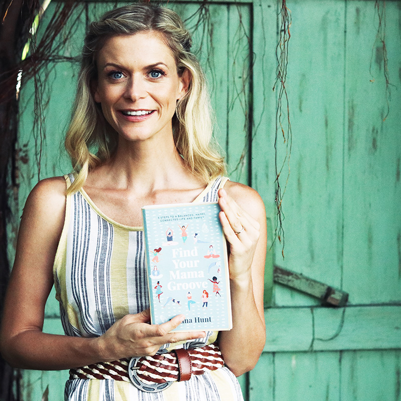 joanna hunt holding her book find your mama groove